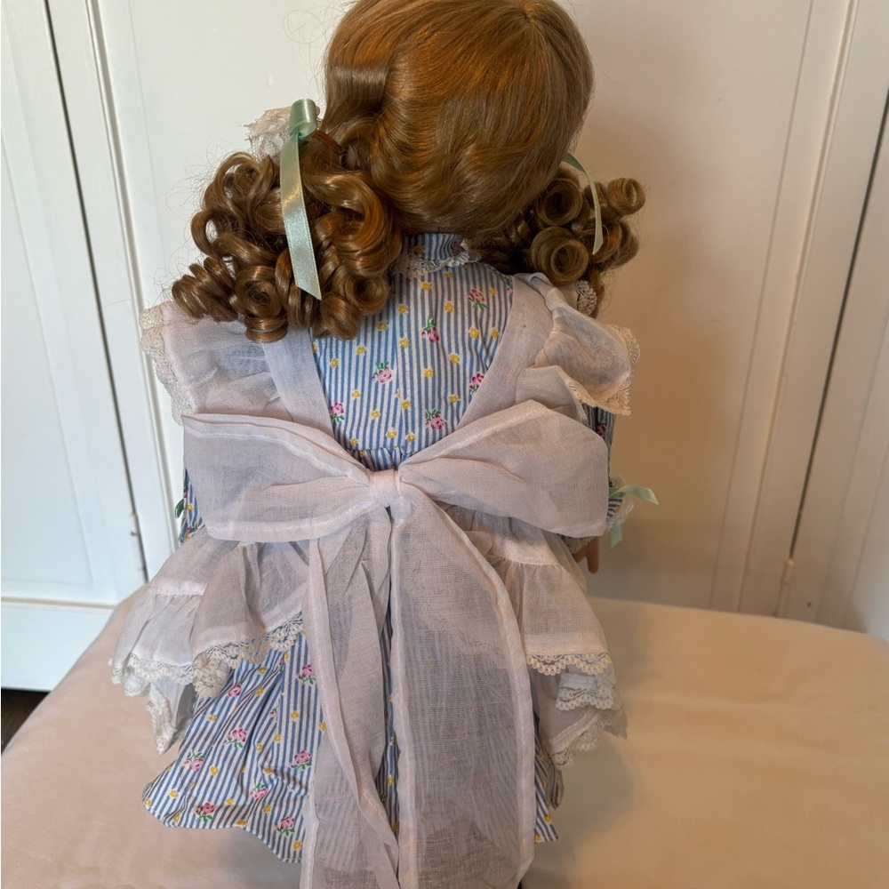Charming Blue and White Porcelain Doll with Curly Hair - Picture 5 of 11